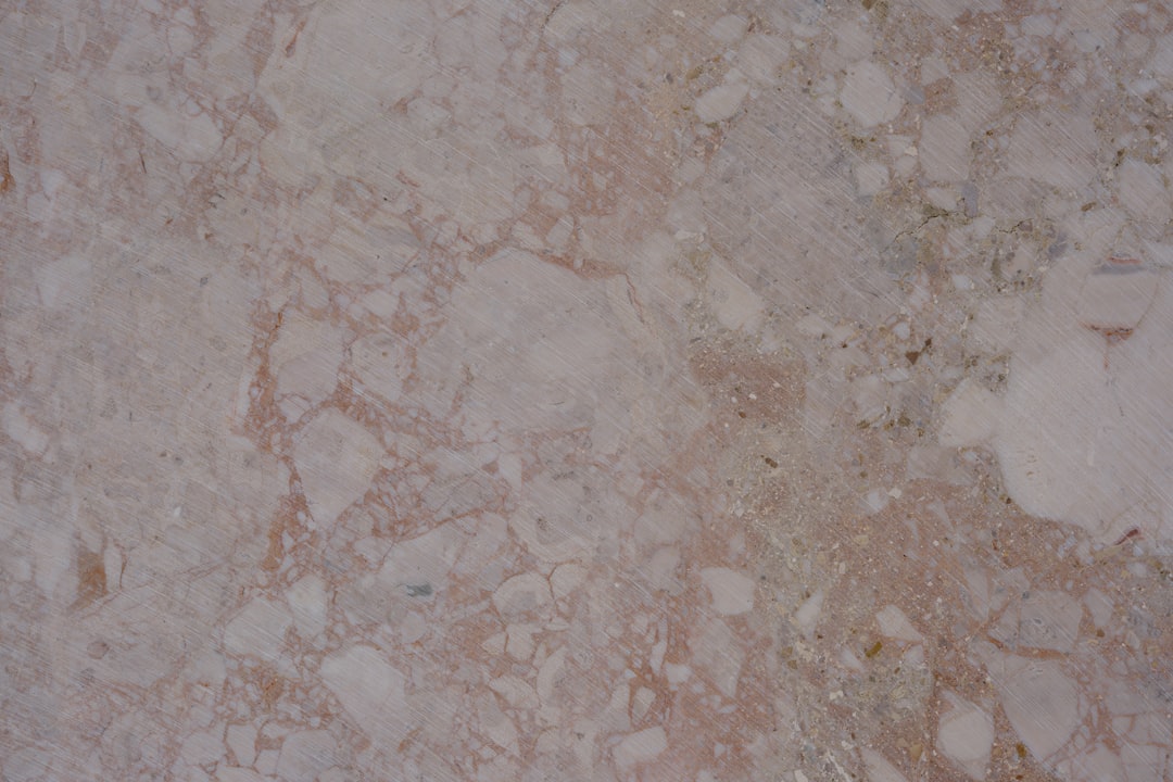 Micro texture detail of premium natural stone travertine surface used in Equim Projects